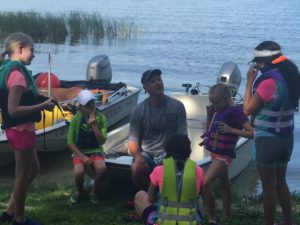 Coach with a group of Opti sailors